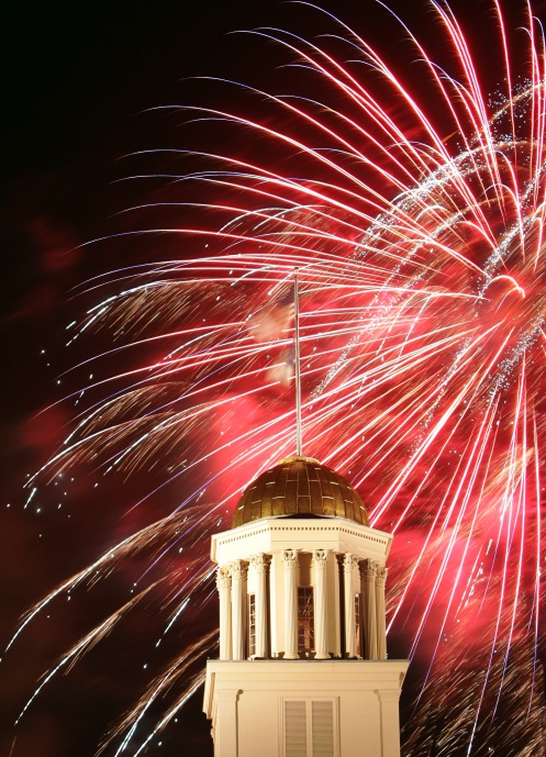 Fireworks explode over the Old Capitol building in downtown Iowa City Saturday July 4th, 2009. A large crowd attended a similar display at Kirkwood Community College in Cedar Rapids, where it was moved because of safety concerns in downtown CR, the normal site of the show. (Brian Ray/The Gazette) 